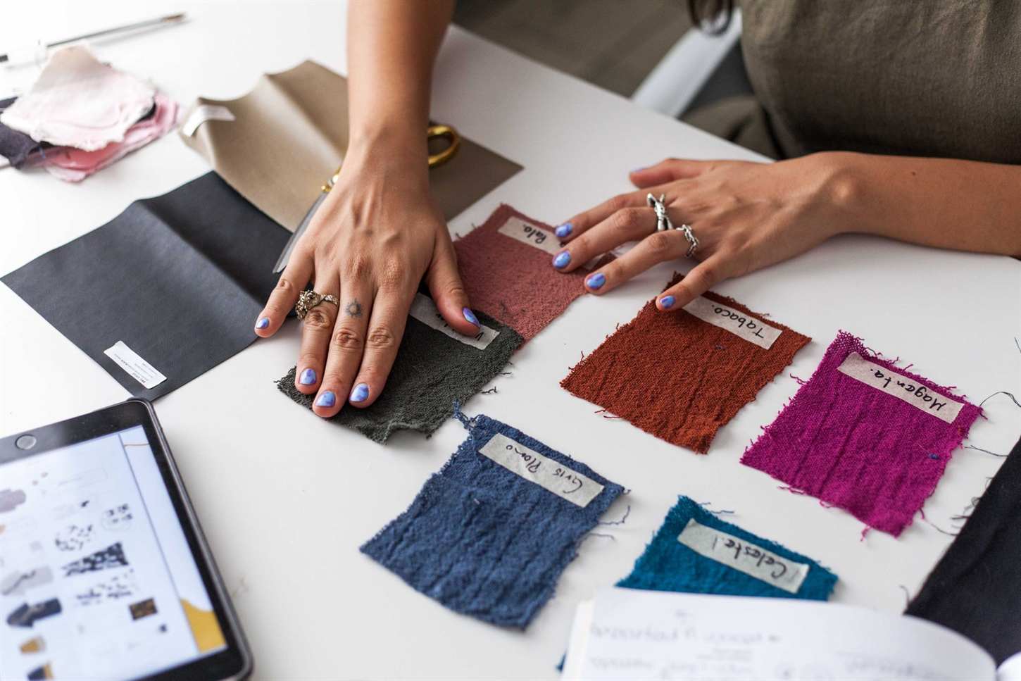 Close-up of fabrics and materials during selection