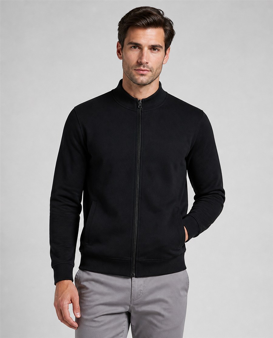Model wearing a BY WORKWEAR zip sweat jacket in black